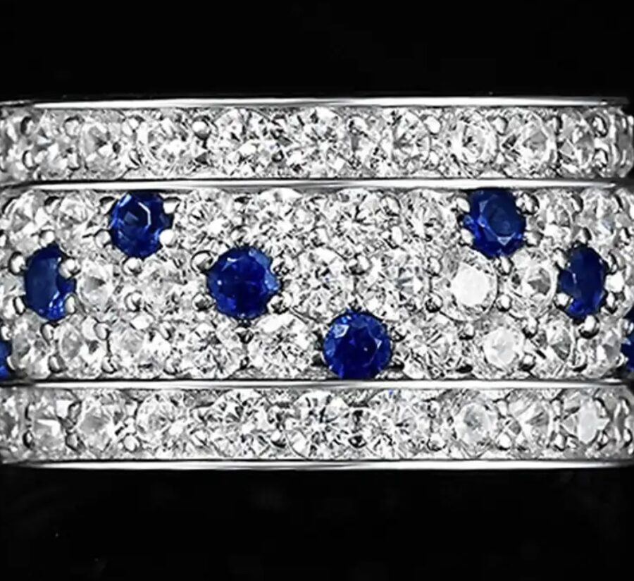 WHITE AND BLUE SAPPHIRE ETERNITY RING