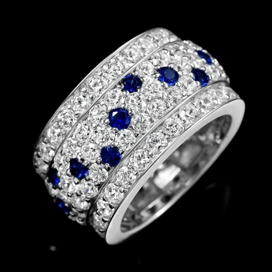 WHITE AND BLUE SAPPHIRE ETERNITY RING - Image 2